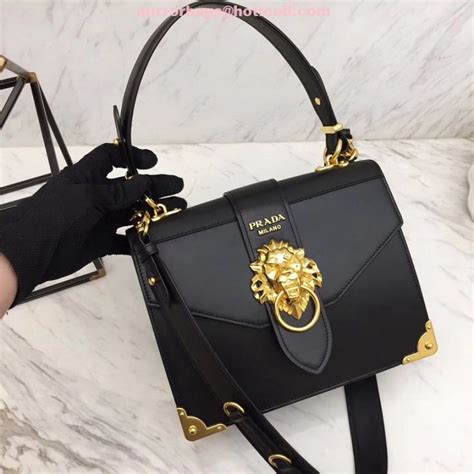 prada lion head bag fake|prada purse logo.